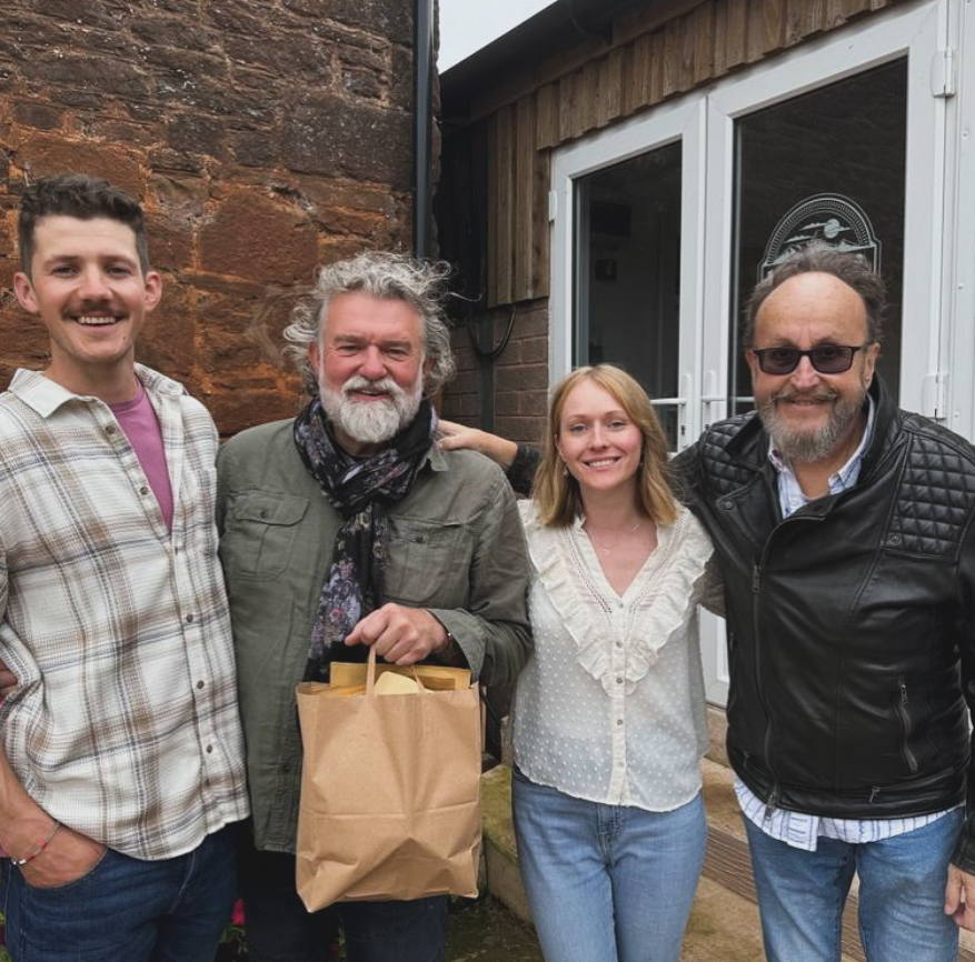 Donwynne and Amy from Inyama Biltong standing with Si King and Dave Myers of The Hairy Bikers after filming at their Devon biltong unit.

